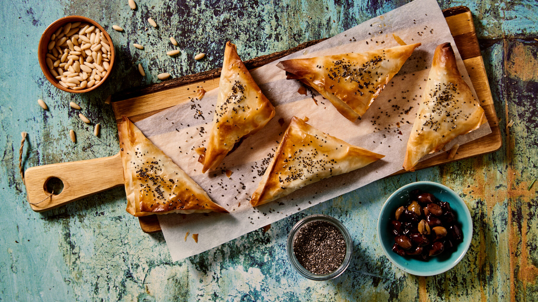 Triangoli di pasta fillo con mele, olive e gorgonzola - Informatore