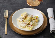 Tortelli al coniglio in bianco al profumo di timo Tortelli